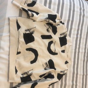 White and black sweater